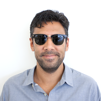 Photo of a man wearing sunglasses.